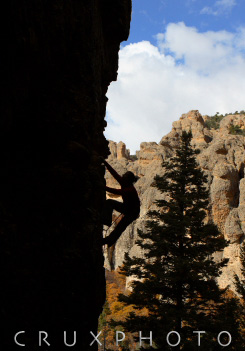 Ericka Prechtel on Godfrys 5.11b in Maple Canyon.  Copyright Nate Young and Crux Photo.
